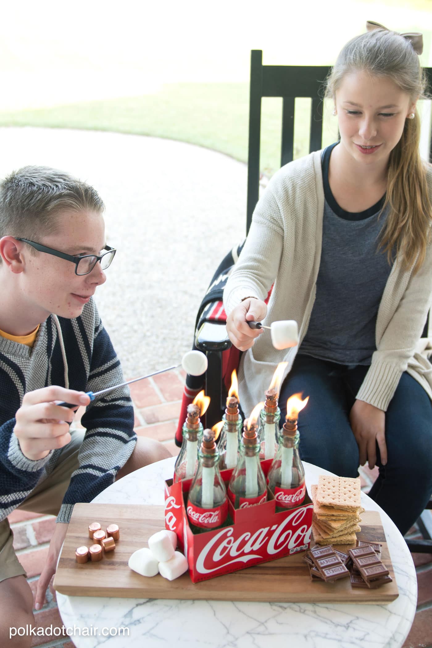 DIY tabletop s'mores maker made from upcycled Coca-Cola bottles