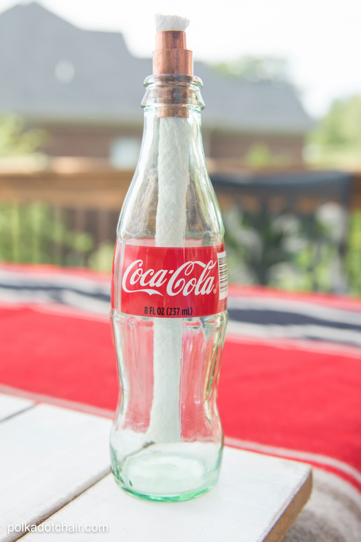 DIY tabletop s'mores maker made from upcycled Coca-Cola bottles