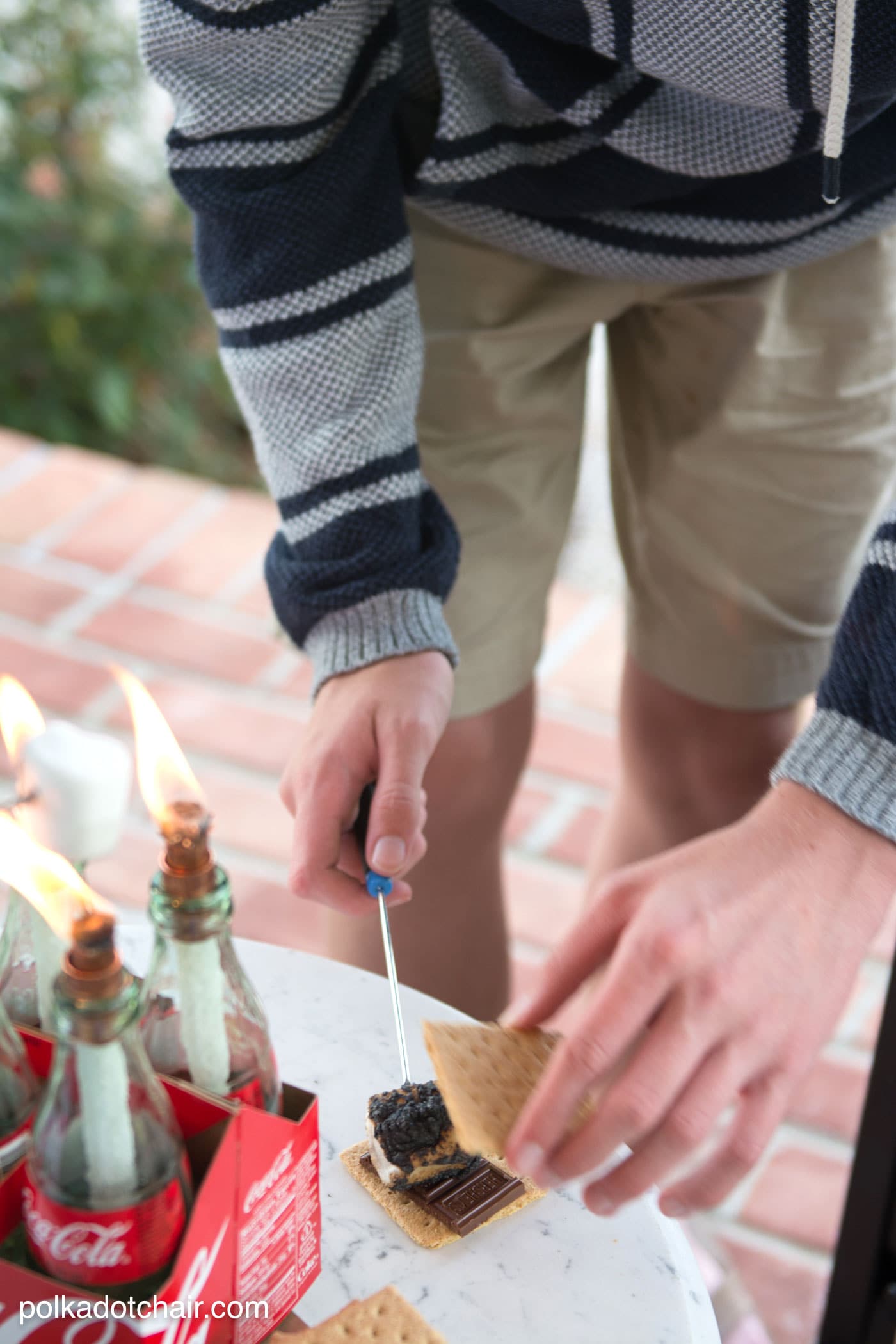 DIY tabletop s'mores maker made from upcycled Coca-Cola bottles