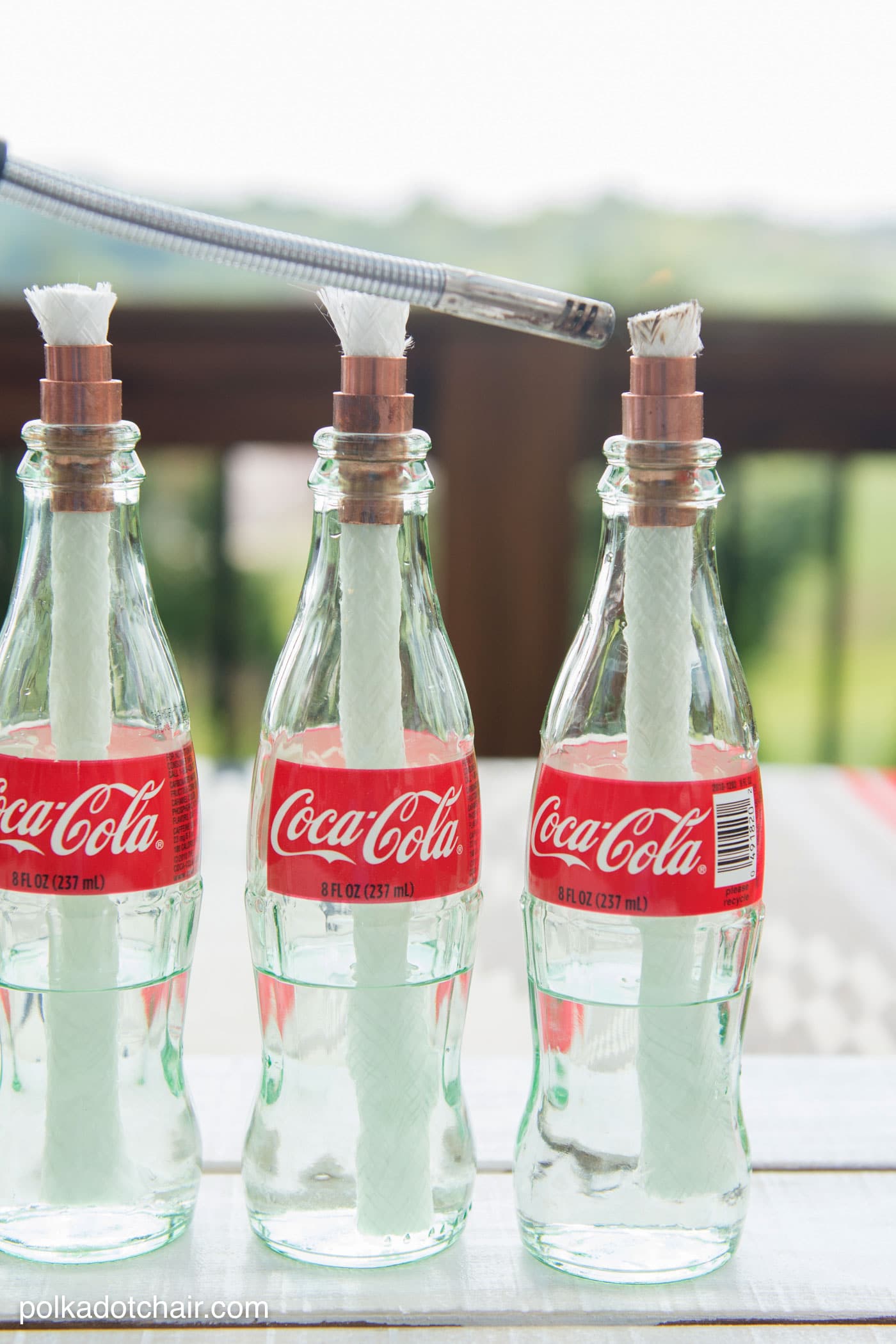 DIY tabletop s'mores maker made from upcycled Coca-Cola bottles