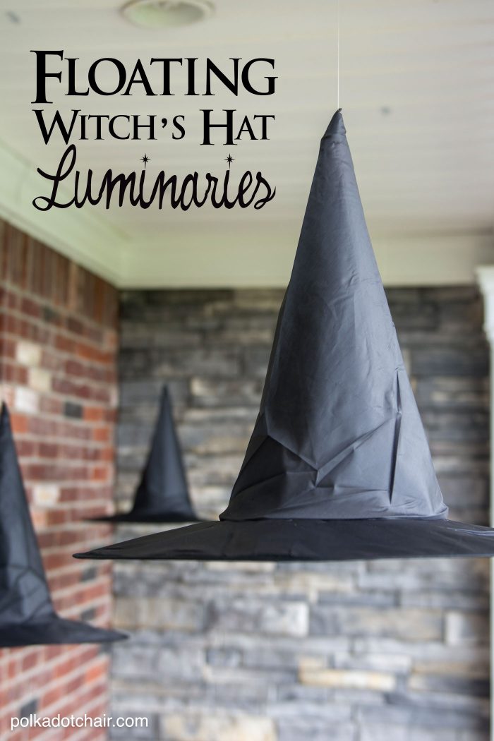 Clever decorating idea for a porch for Halloween, floating Witch's hat luminaries, they even light up at night!