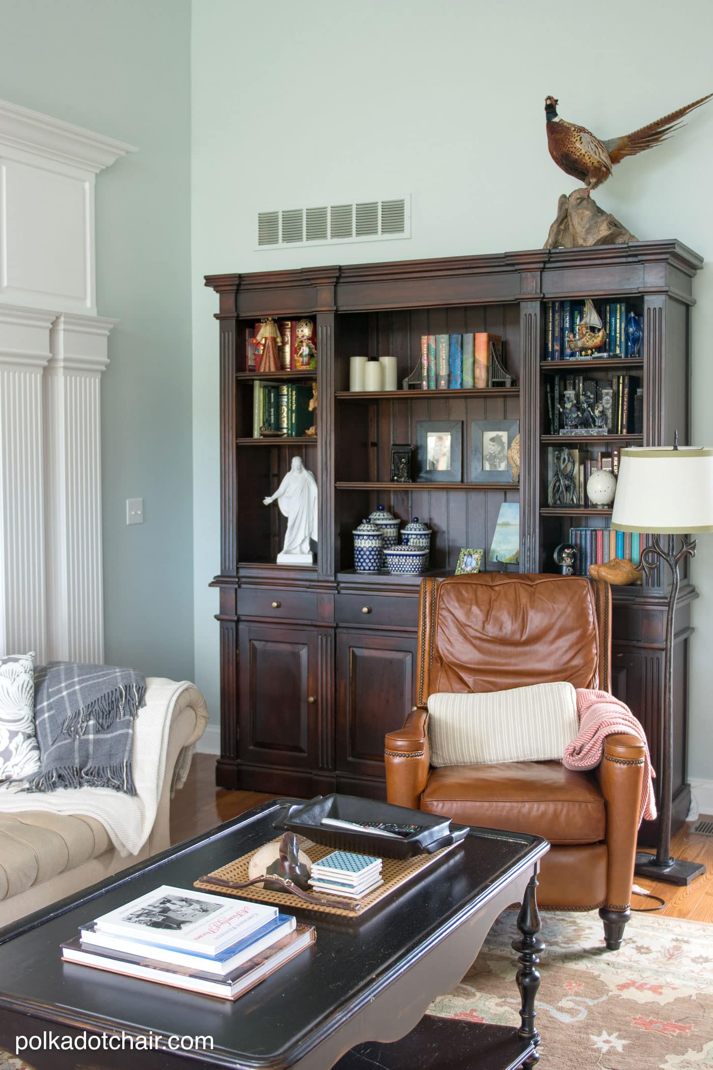 Living Room Decor Ideas, the paint color on the walls is Serene Journey by BEHR