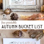 Printed out Autumn bucket lists on wood table in frame