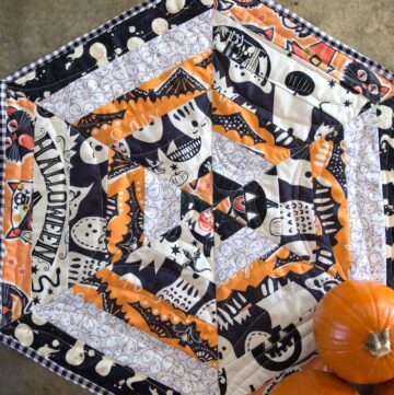 Halloween Quilted Table Topper Sewing Tutorial, so cute you could change out the fabric and use it for any Holiday!
