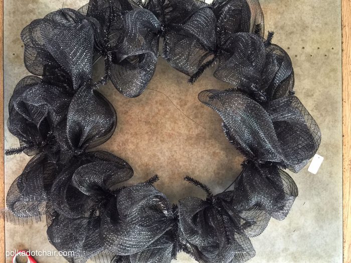 How to make a cute Halloween Eyeball wreath for your front door out of Geo Mesh and ribbon. 