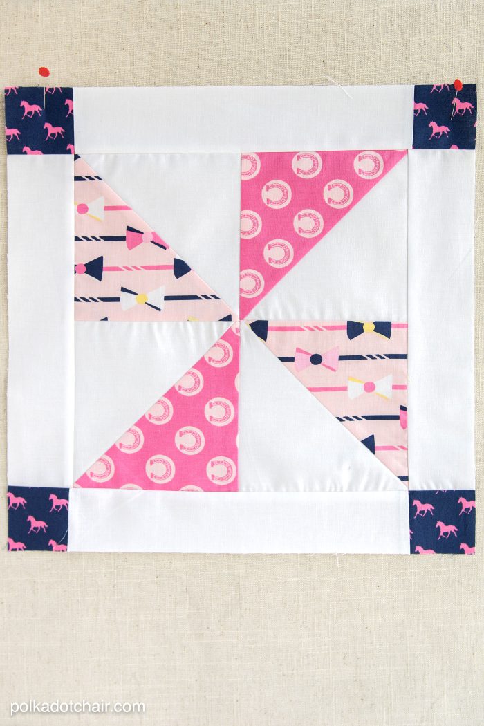 Pinwheel quilt block on linen background