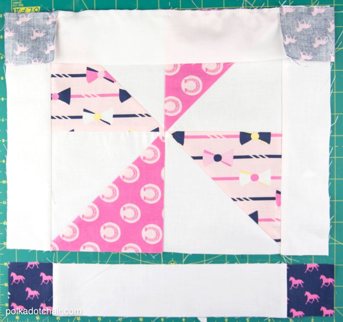 The October Quilt Block of the Month, a variation of a simple pinwheel block. Join in the block of the month series and make a quilt one month at a time.