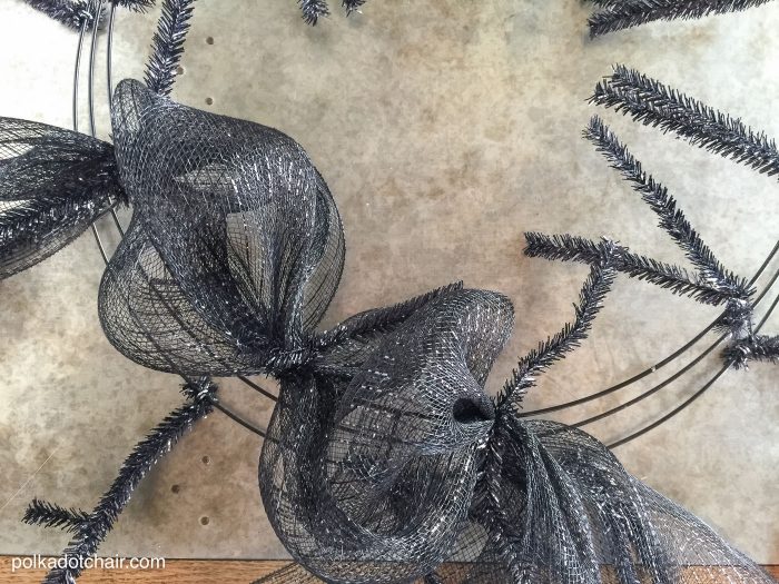 How to make a cute Halloween Eyeball wreath for your front door out of Geo Mesh and ribbon. 