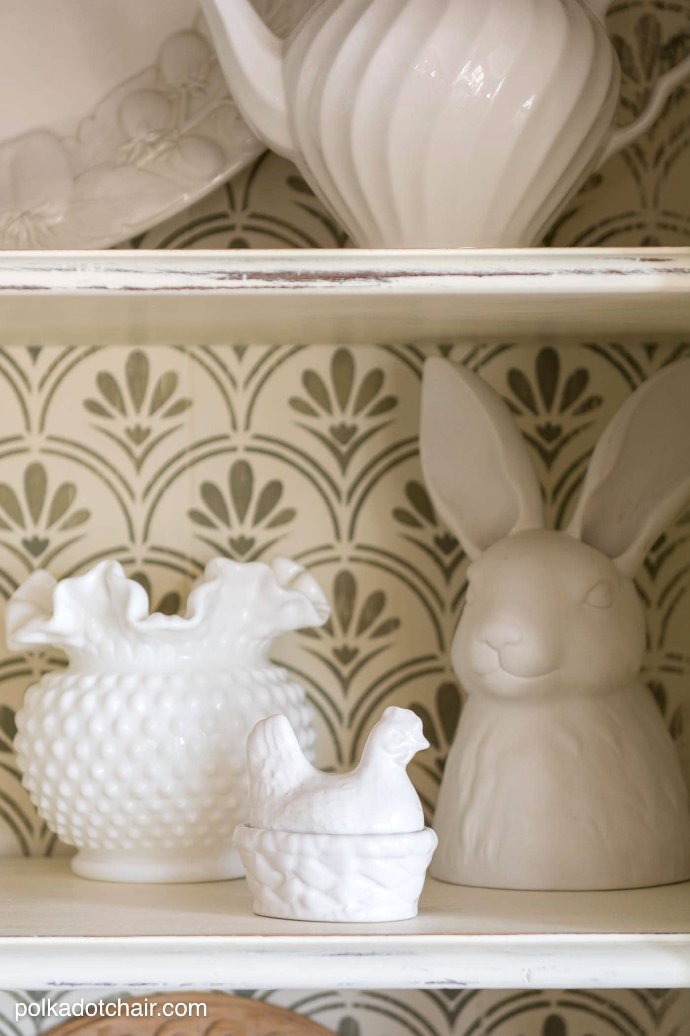 DIY Stenciled Bookcase Project, she painted the bookcase with chalk paint then stenciled a pattern onto the back, looks pretty simple