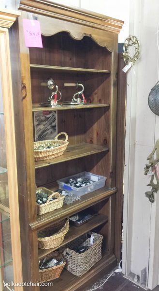 DIY Stenciled Bookcase Project, she painted the bookcase with chalk paint then stenciled a pattern onto the back, looks pretty simple