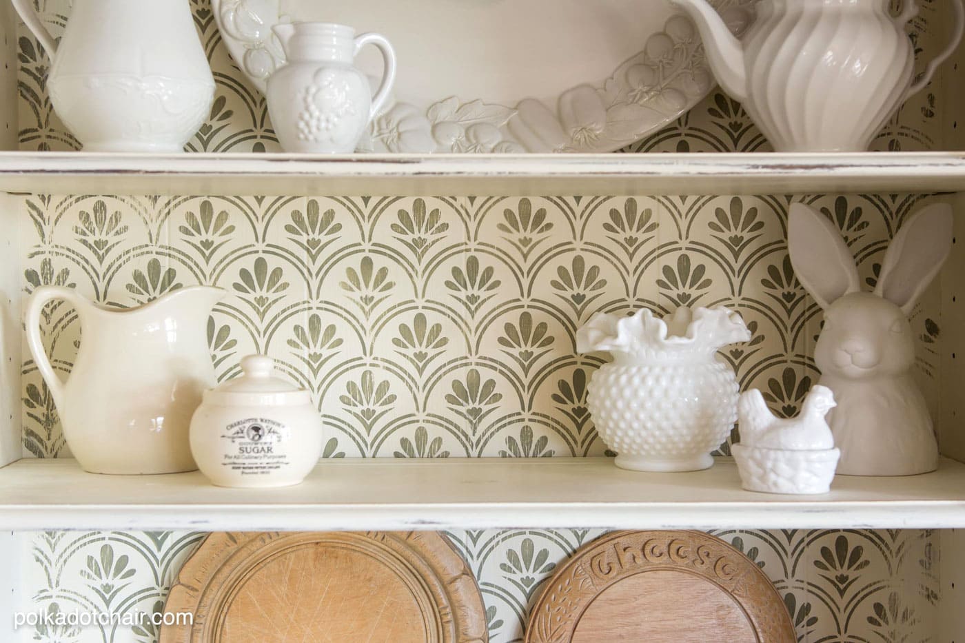 DIY Stenciled Bookcase Project, she painted the bookcase with chalk paint then stenciled a pattern onto the back, looks pretty simple