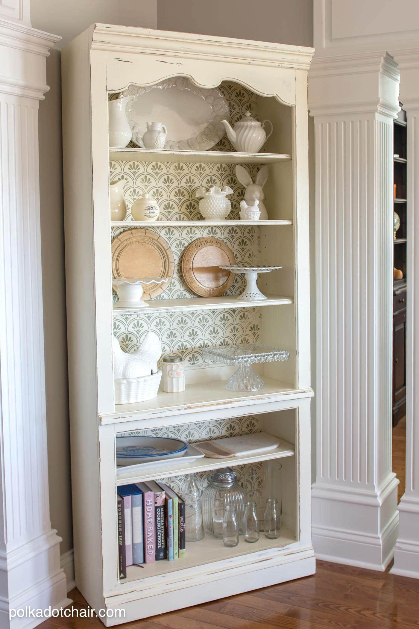 DIY Stenciled Bookcase Project, she painted the bookcase with chalk paint then stenciled a pattern onto the back, looks pretty simple