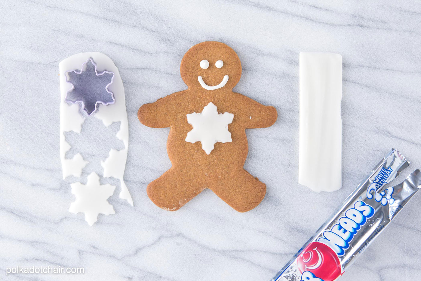 Gingerbread Christmas Cookie Decorating Ideas, use Airheads candy to cut out "clothes" and accessories for your gingerbread men