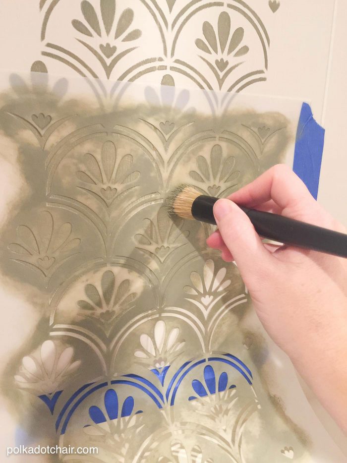 DIY Stenciled Bookcase Project, she painted the bookcase with chalk paint then stenciled a pattern onto the back, looks pretty simple