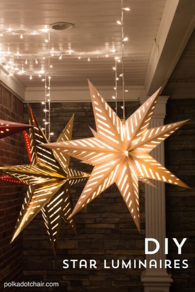 Hanging paper stars on front porch at night