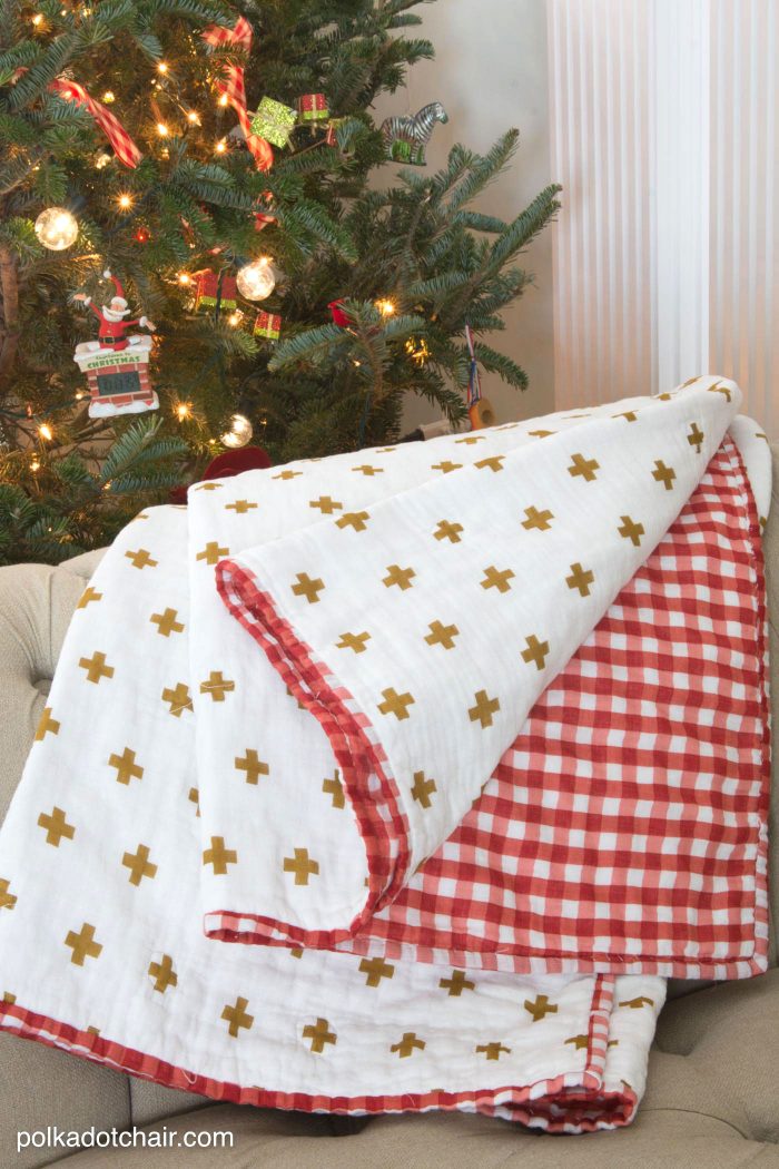 Learn how to make a simple quilted blanket out of double gauze material with this free sewing tutorial, cute project for Christmas or any time of the year (would also be a great baby blanket)