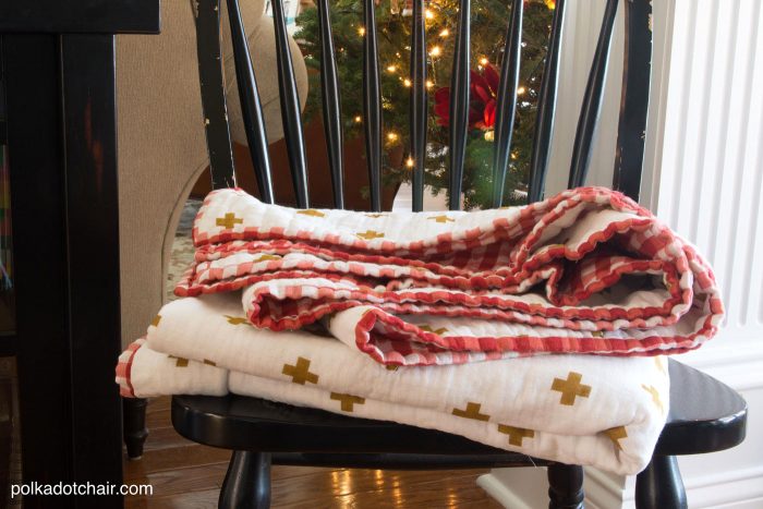 Learn how to make a simple quilted blanket out of double gauze material with this free sewing tutorial, cute project for Christmas or any time of the year (would also be a great baby blanket)