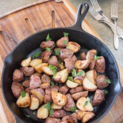 Recipe for red potatoes cooked in a cast iron skillet. Great, easy weeknight dinner side dish recipe!