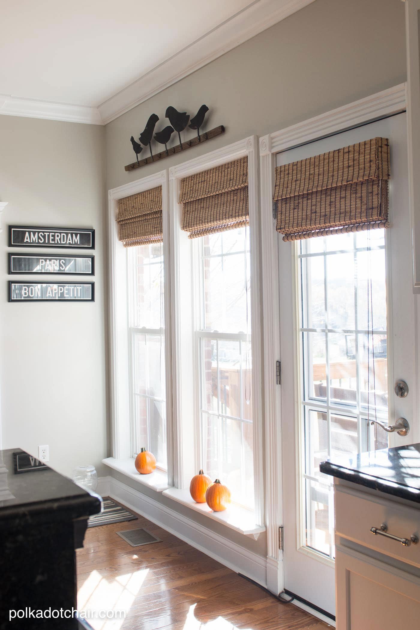 Before and After Photos of a Kitchen that had it's Cabinets Painted White- lots of great ideas for decorating a farmhouse style kitchen!