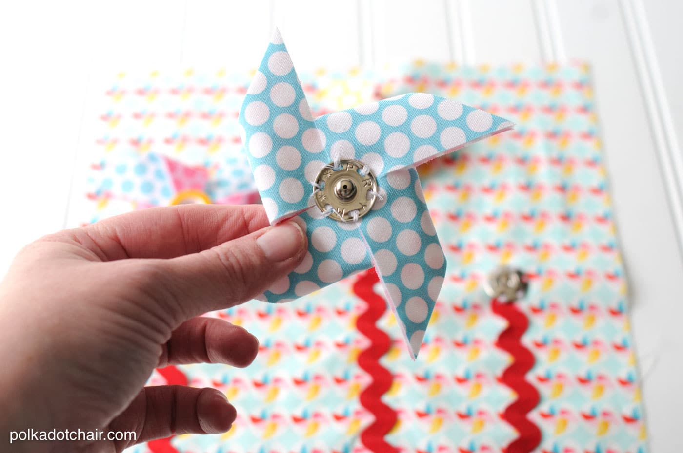 Sewing Pattern for a quiet book page with snap on pinwheels.