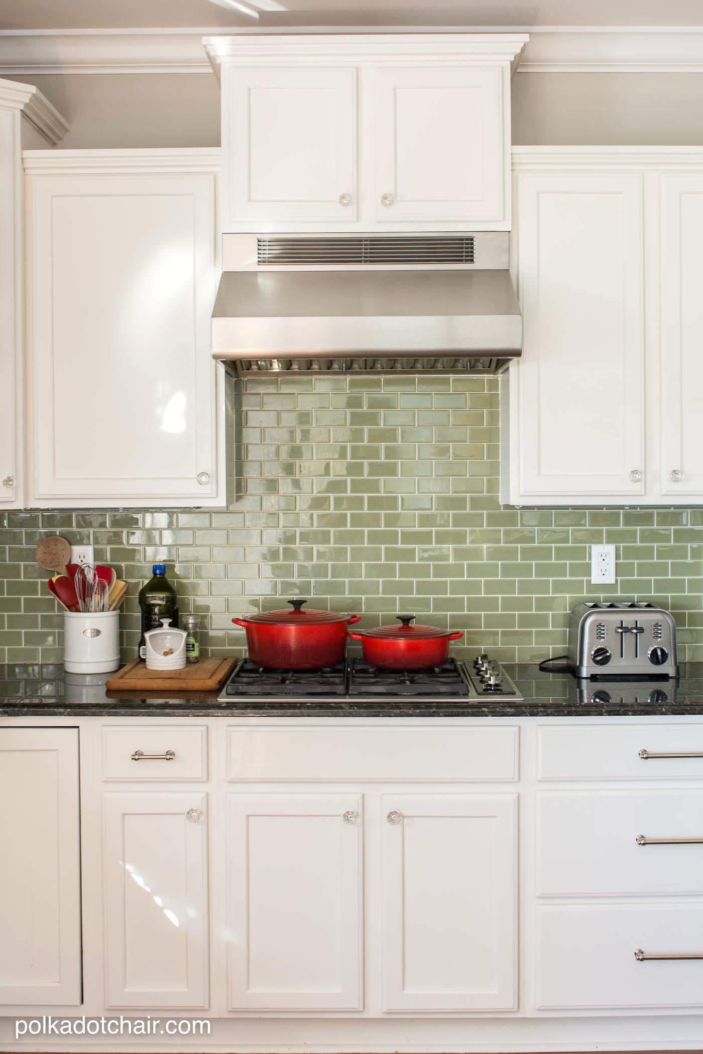 Green Glass Tile Backsplash & Before and After Photos of a Kitchen that had it's Cabinets Painted White- lots of great ideas for decorating a farmhouse style kitchen!