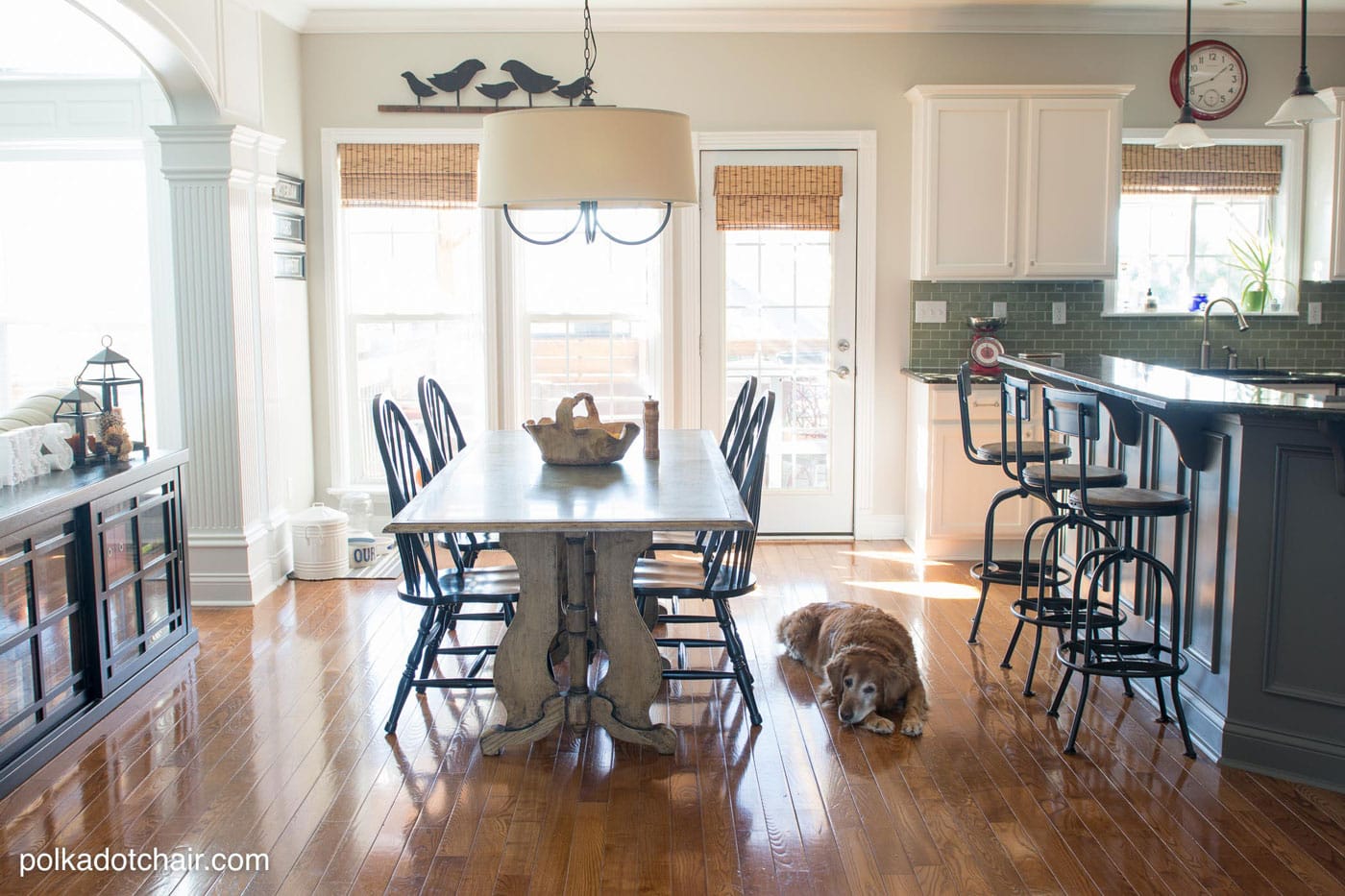 Before and After Photos of a Kitchen that had it's Cabinets Painted White- lots of great ideas for decorating a farmhouse style kitchen!