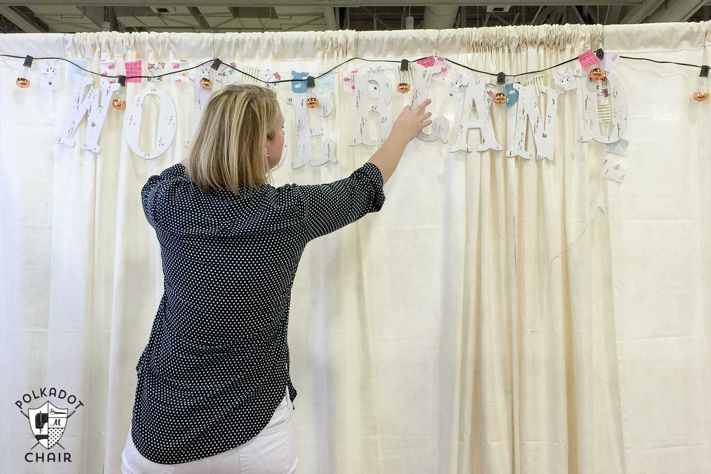 Photos from the Riley Blake booth at Spring Quilt market, lots of cute sewing and quilting projects using Wonderland Fabric