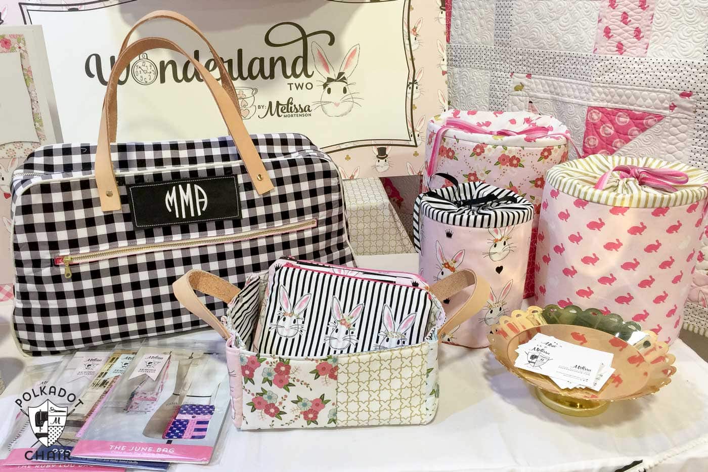 Photos from the Riley Blake booth at Spring Quilt market, lots of cute sewing and quilting projects using Wonderland Fabric