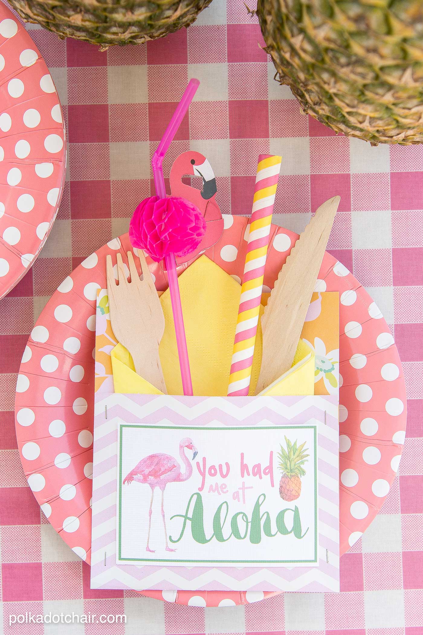 Lots of fun ideas to throw a backyard flamingo themed pool party, including free printable silverware containers and a recipe for pineapple and mango virgin pina coladas 