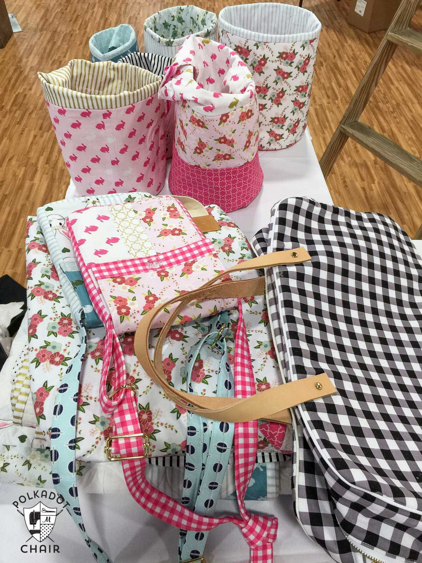 Photos from the Riley Blake booth at Spring Quilt market, lots of cute sewing and quilting projects using Wonderland Fabric