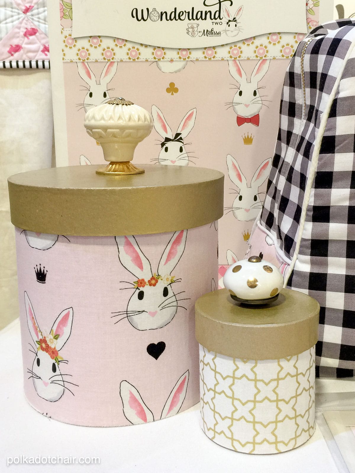 Learn how to cover paper mache boxes with fabric to make these cute DIY storage containers!