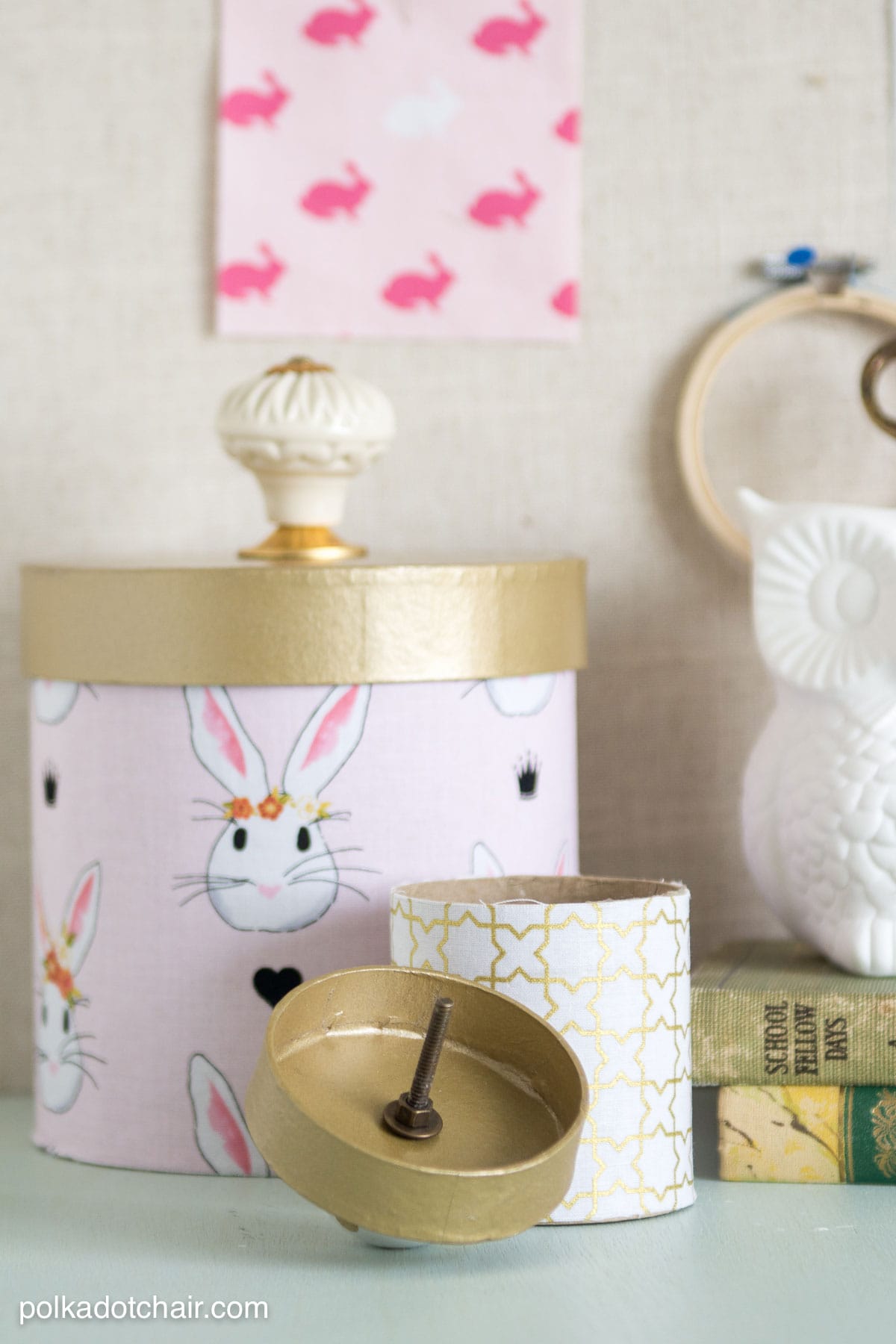 Learn how to cover paper mache boxes with fabric to make these cute DIY storage containers!