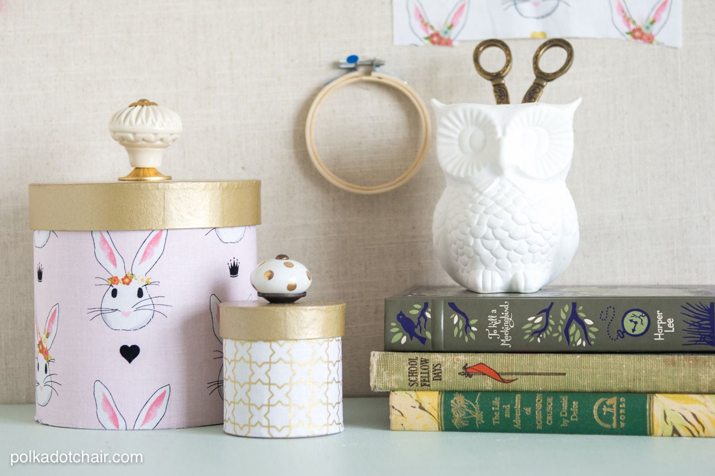 Learn how to cover paper mache boxes with fabric to make these cute DIY storage containers!