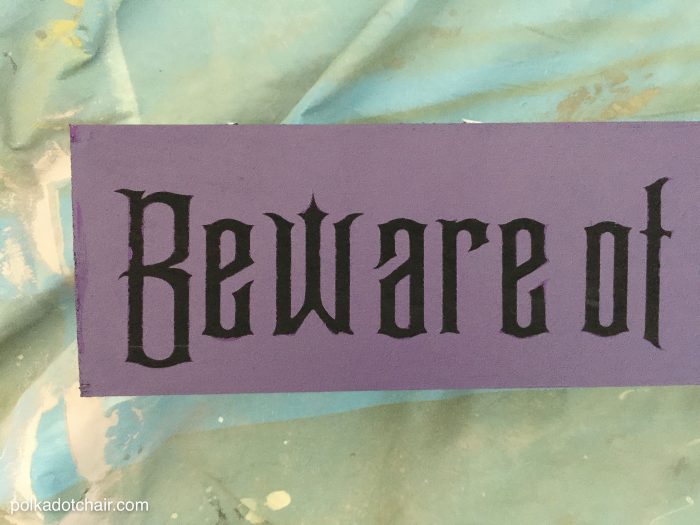 How to make your own Wood Halloween Sign; A cute "Beware of Hitchhiking Ghosts" Haunted Mansion Inspired DIY Project!