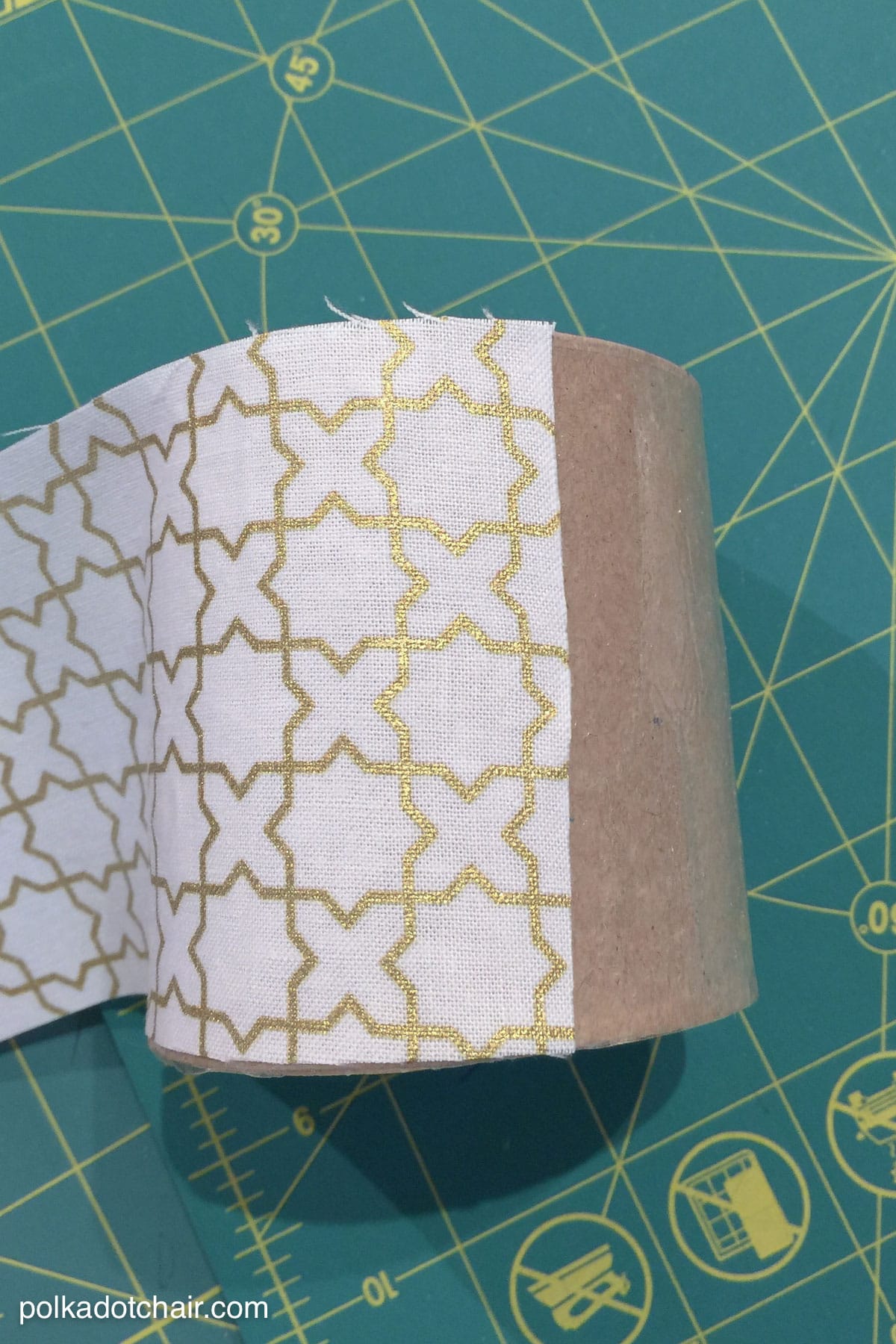 Learn how to cover paper mache boxes with fabric to make these cute DIY storage containers!