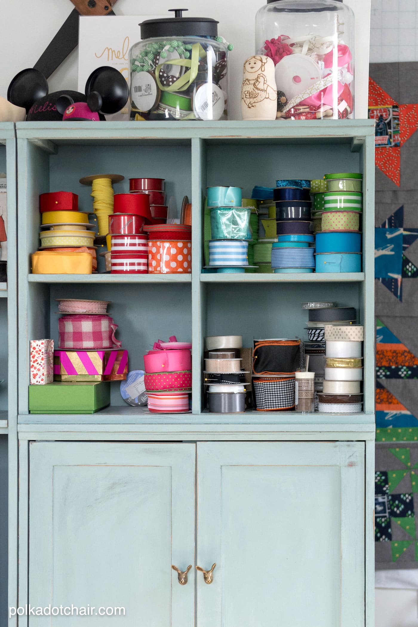 Blue book shelves with ribbon on it