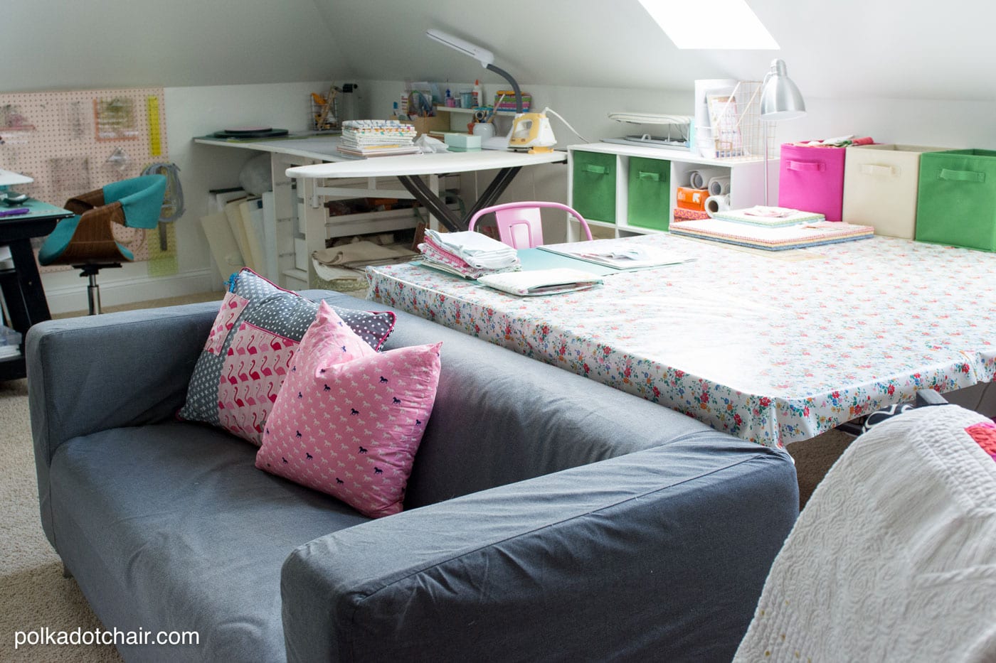 sewing room with grey couch