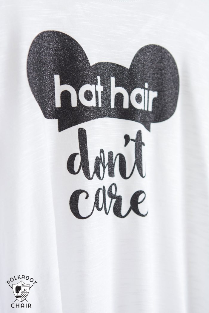 Make your own DIY Disney T-shirt with this free cut file and iron on vinyl. Cute "hat hair don't care" Mickey Ears Disney tshirt!