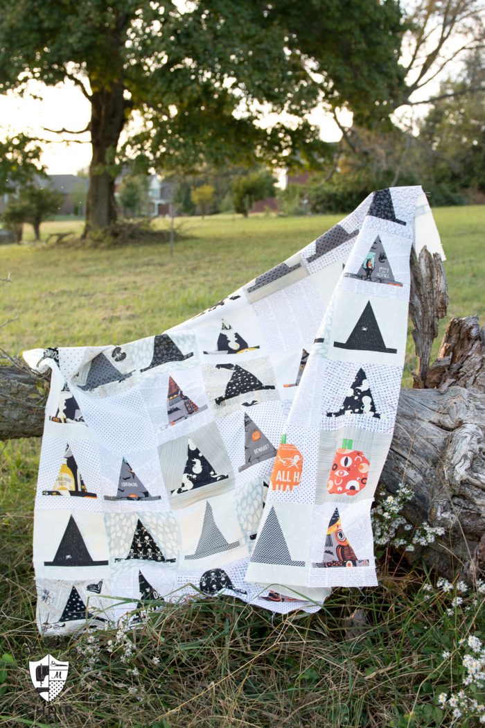 The Halloween Haberdashery Quilt; a fun Halloween sewing and quilting project featuring rows of Witch's Hat quilt blocks.