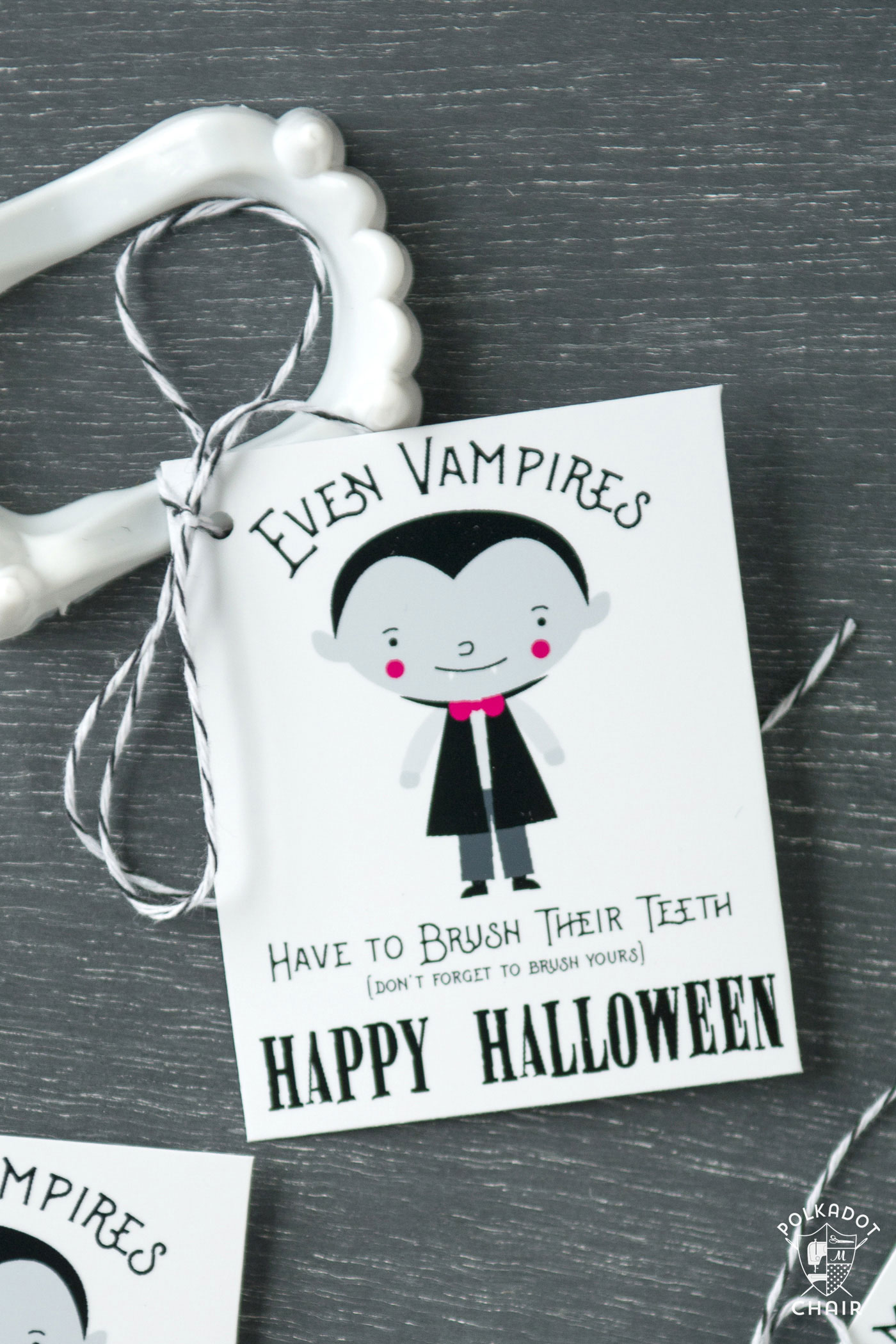 Cute non-candy Halloween Treat idea - free printable tags to attach to vampire teeth! 