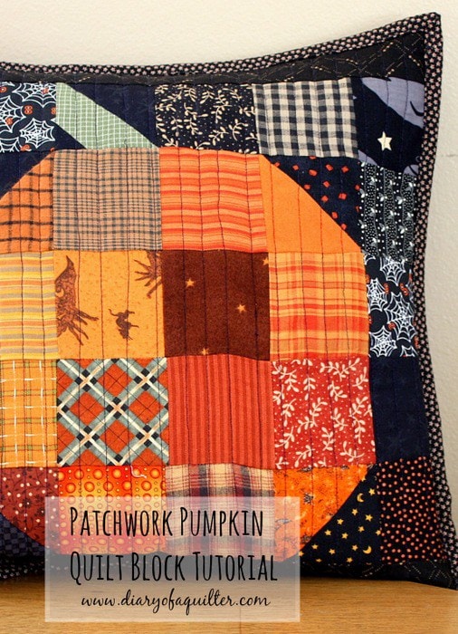 Black and orange patchwork pumpkin pillow on wood chair