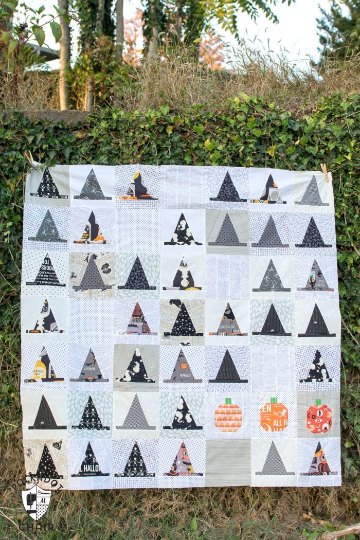 The Halloween Haberdashery Quilt; a fun Halloween sewing and quilting project featuring rows of Witch's Hat quilt blocks.