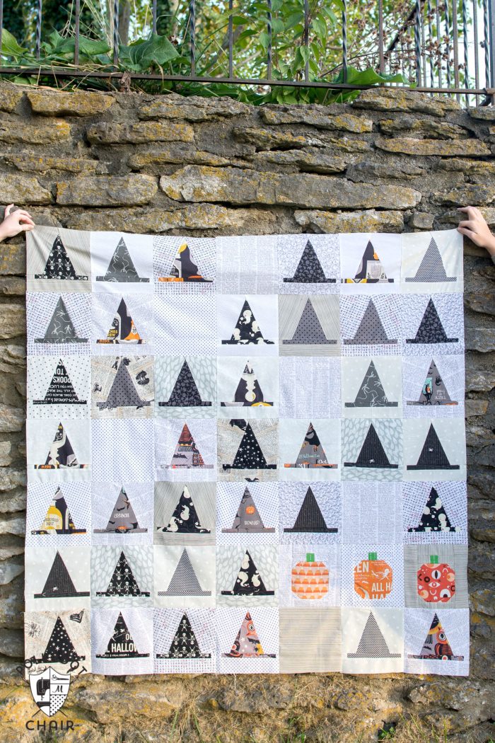 The Halloween Haberdashery Quilt; a fun Halloween sewing and quilting project featuring rows of Witch's Hat quilt blocks.
