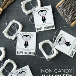 Cute non-candy Halloween Treat idea - free printable tags to attach to vampire teeth!