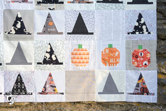 The Halloween Haberdashery Quilt; a fun Halloween sewing and quilting project featuring rows of Witch's Hat quilt blocks.