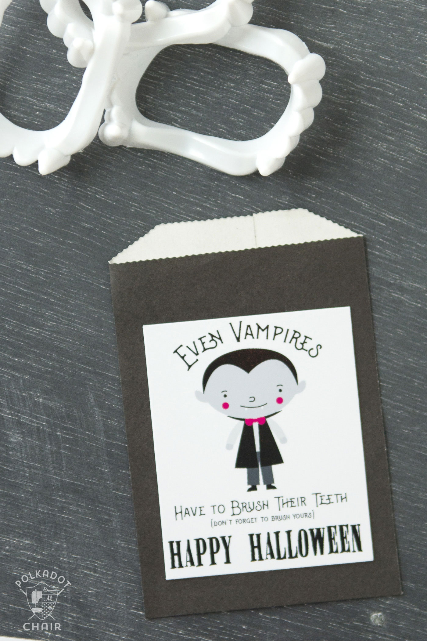 Cute non-candy Halloween Treat idea - free printable tags to attach to vampire teeth! 