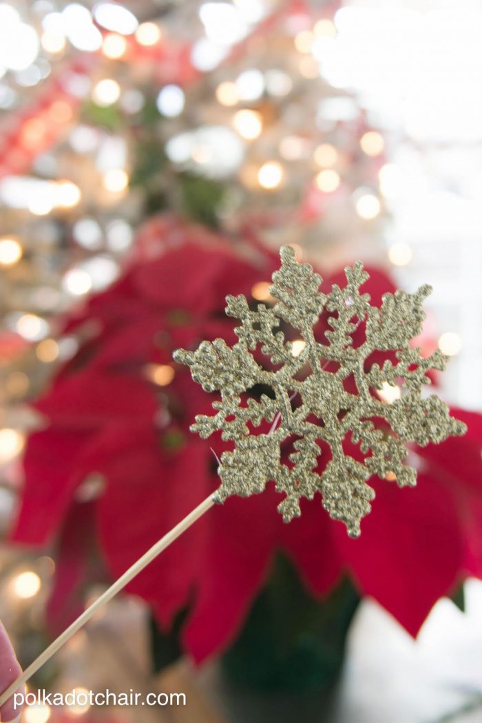 Cute Christmas Neighbor Gift ideas-a Poinsettia decorated with ornament tags and a Poinsettia poem attached - from polkadotchair.com