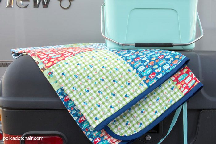 DIY Patchwork Waterproof Picnic Blanket Pattern, an easy to sew tutorial for a picnic blanket that rolls up!