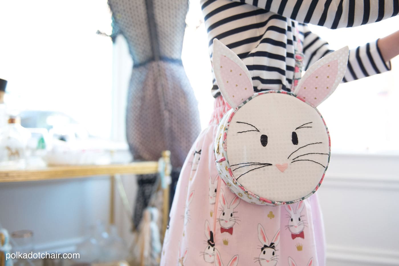 Introducing the Alice Bag Sewing Pattern. A whimsical and versatile purse sewing pattern featuring bunny ears! It can be made in two sizes and features 4 different handle style options including cross body straps!