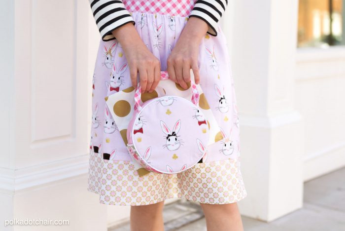 Introducing the Alice Bag Sewing Pattern. A whimsical and versatile purse sewing pattern featuring bunny ears! It can be made in two sizes and features 4 different handle style options including cross body straps!